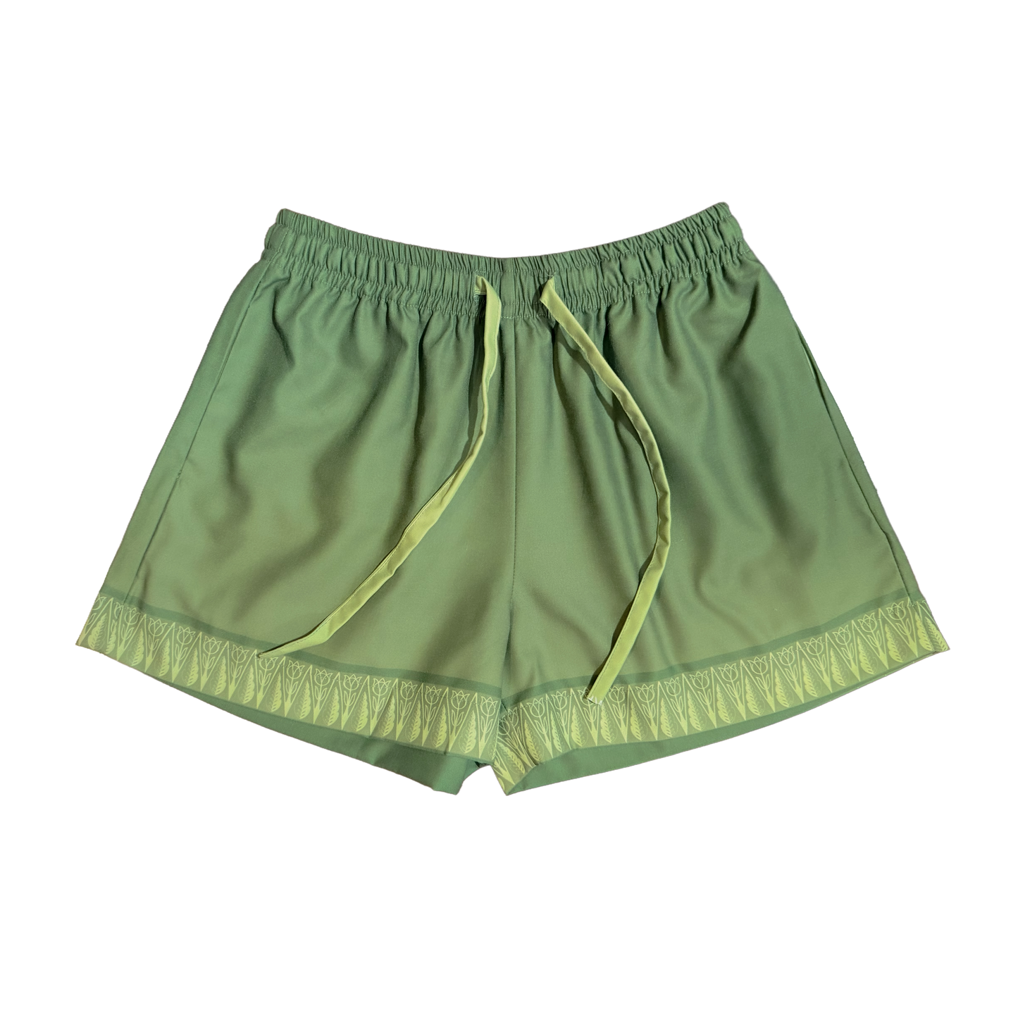 Green shorts with lace trim on a white background